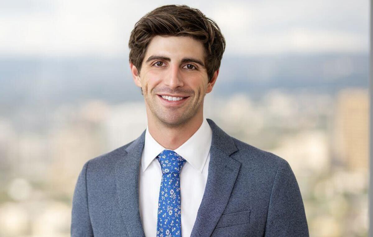 Runner Bobby Graves wearing a suit jacket and tie