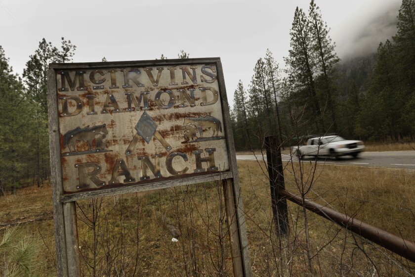 An old sign marks the entrance to the McIrvin family’s Diamond M Ranch in northeastern Washington. 