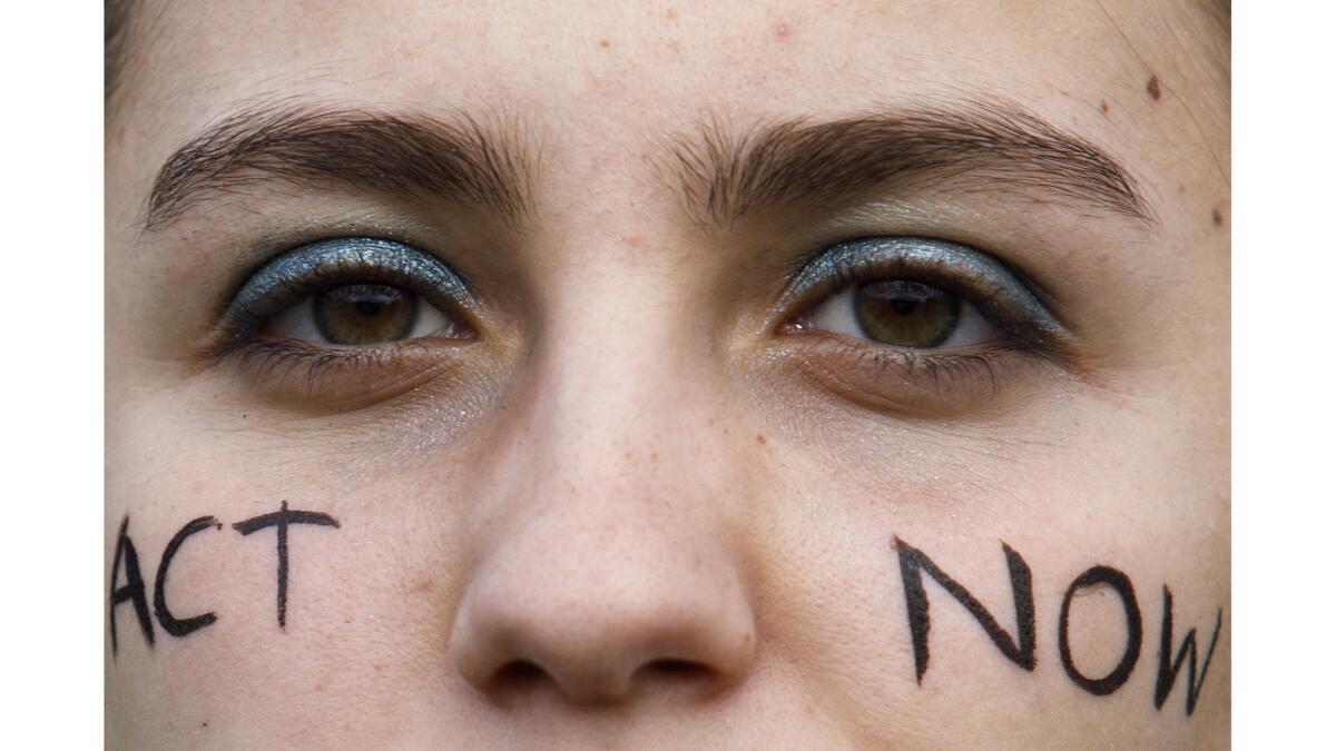 Lucia Dominguez of Spain participates in the youth climate protest on Friday in Washington. Students around the world took to the streets to demand that elected officials take action on climate change.