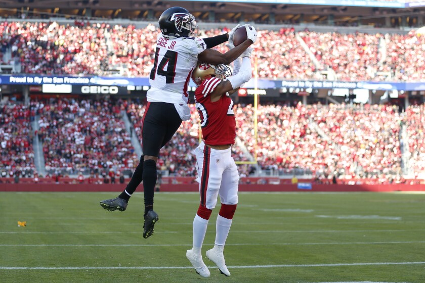 Atlanta Falcons wide receiver Russell Gage Jr. (14) catches a touchdown over San Francisco 49ers cornerback Ambry Thomas during the first half of an NFL football game in Santa Clara, Calif., Sunday, Dec. 19, 2021. (AP Photo/Jed Jacobsohn)