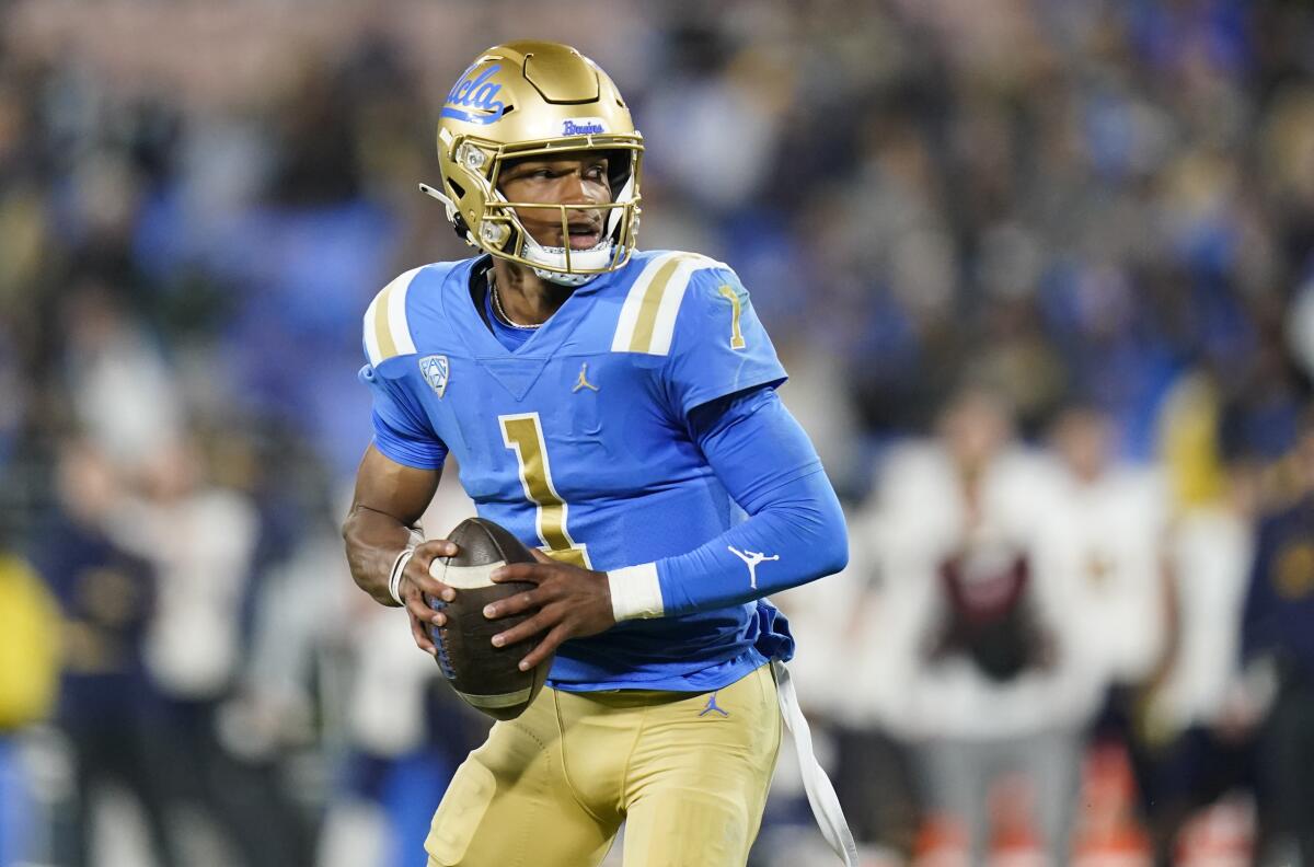 UCLA quarterback Dorian Thompson-Robinson pulls back to throw a pass during the first half of a game against California