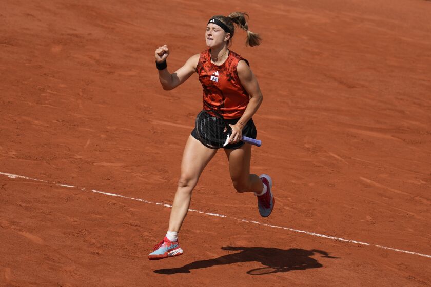 Karolina Muchova of the Czech Republic clenches her fist after winning the first set against Aryna Sabalenka of Belarus during their semifinal match of the French Open tennis tournament at the Roland Garros stadium in Paris, Thursday, June 8, 2023. (AP Photo/Thibault Camus)