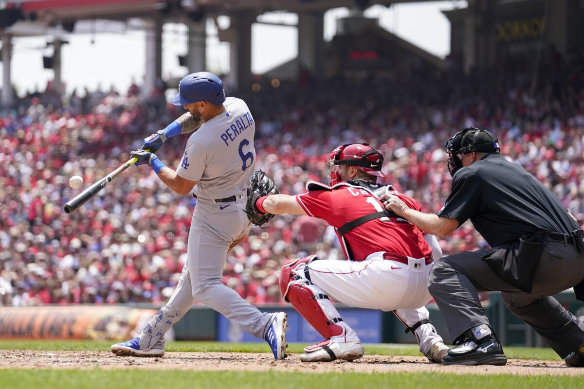 David Peralta hits a two-run single in the third inning for the Dodgers on Thursday.