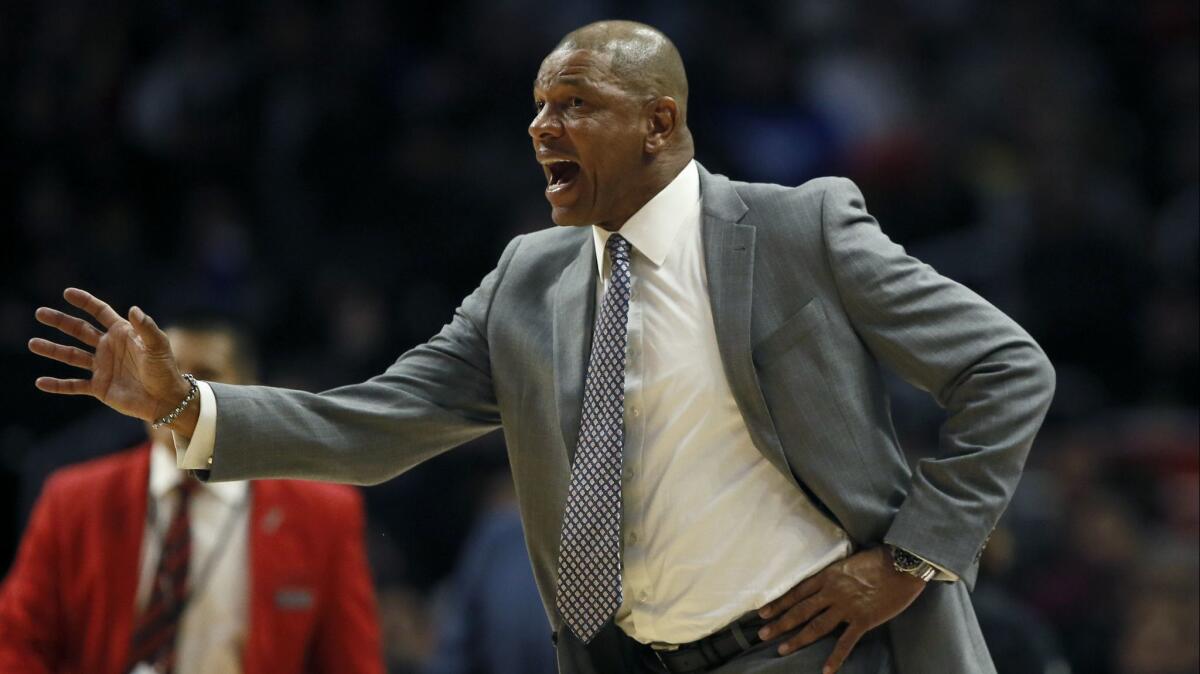 Clippers coach Doc Rivers instructs his players during a game against the Dallas Mavericks on Feb. 25.