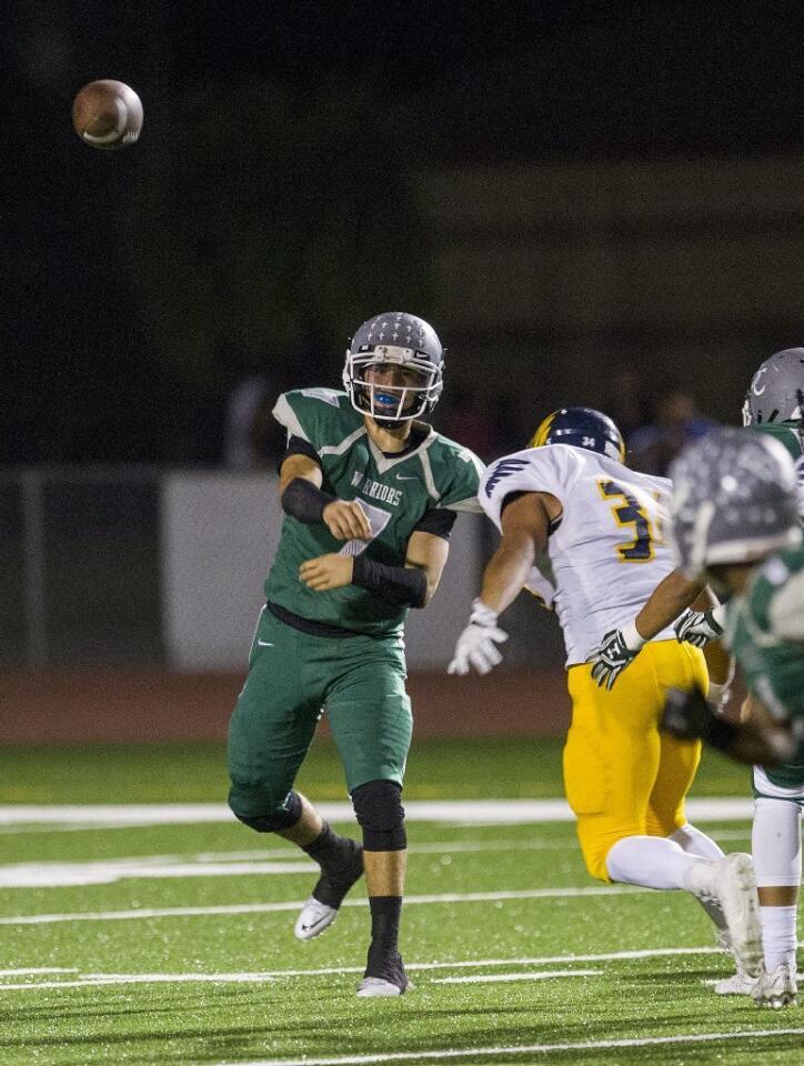 Brethren Christian's Joey Gutierrez throws a pass during a game against Rancho Christian on Friday.