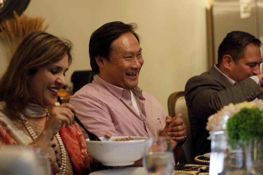 LOS ANGELES, CA APRIL 18, 2018: Dr. Amna Qazi, (left-right), Tom Chang, Ernesto Hidalgo, and Veronica Perez participate in a embRACE L.A. dinner party at her homes in Los Angeles, CA April 18, 2018. embRACE L.A. is an initiative aimed at unifying Angelenos and empowering communities through a citywide conversation about race and racism challenging and changing inequities. While the point of the dinner was to talk about race, the group also wanted to talk about homelessness in Los Angeles. (Francine Orr/ Los Angeles Times)