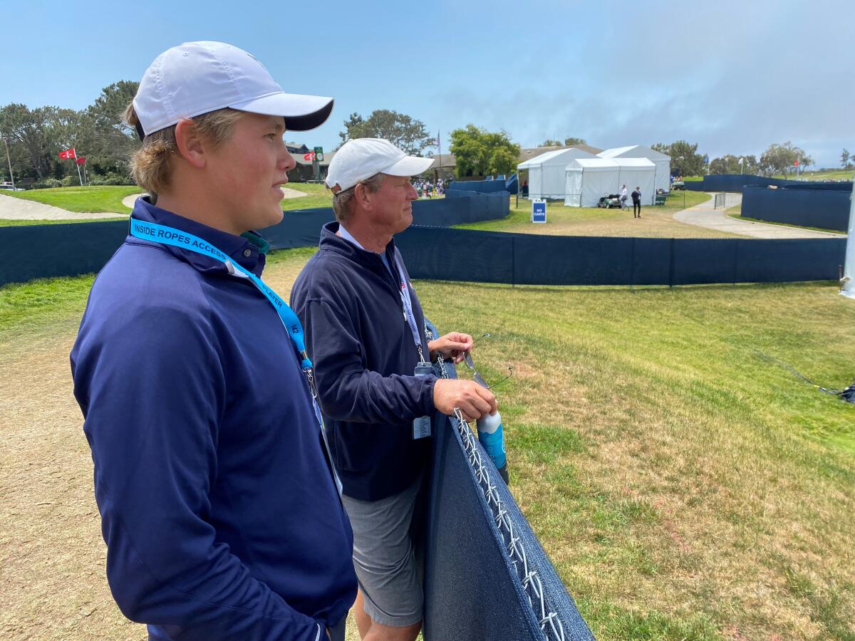 Rick and Joe Neuheisel overlooking the driving range at Torrey Pines.