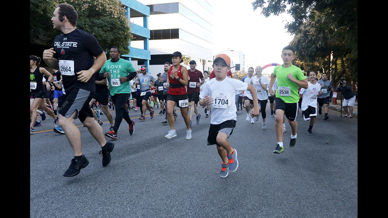 Photo Gallery Large crowd up early for the annual Burbank YMCA Turkey Trot