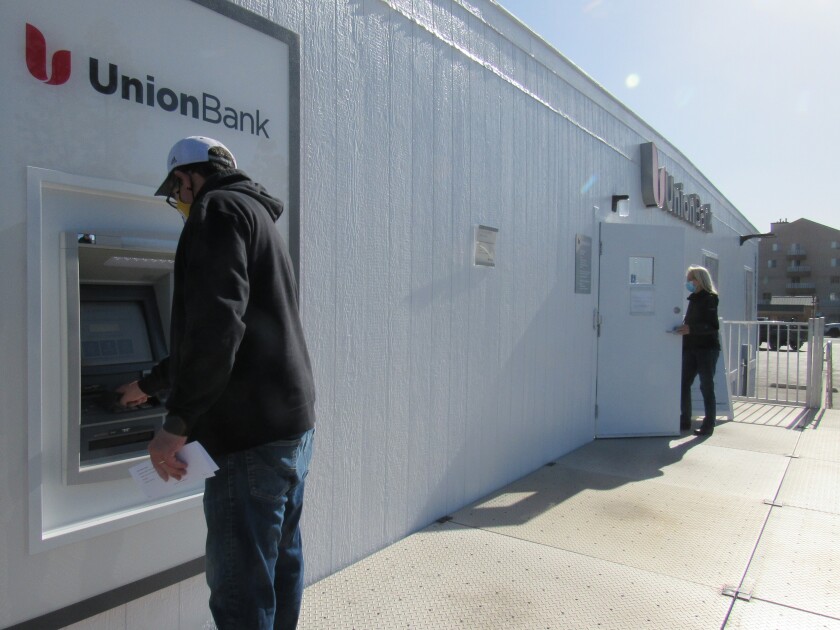 La Mesa City Councilman Bill Baber uses the Union Bank ATM.