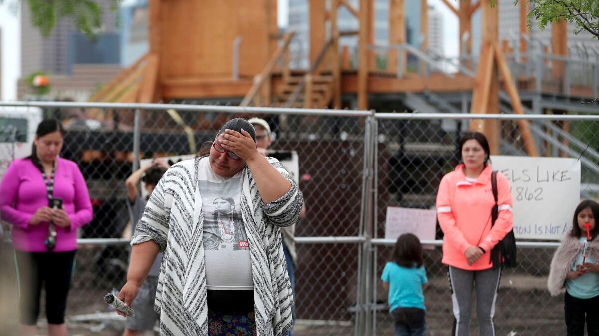 Crystal Norcross, of Sisseton Wahpeton Dakota descent, speaks at a protest at the Minneapolis Sculpture Garden in late May. (David Joles / Star Tribune)