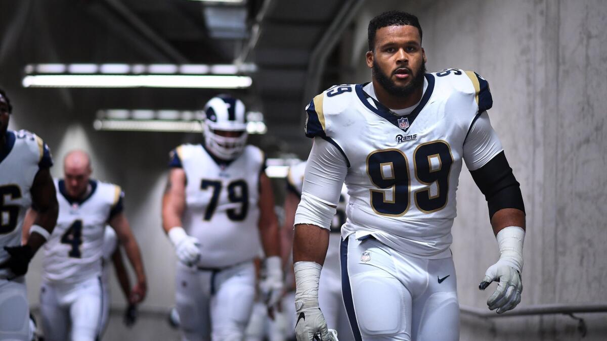 Rams defensive tackle Aaron Donald walks through the tunnel at Ford Field in Detroit.