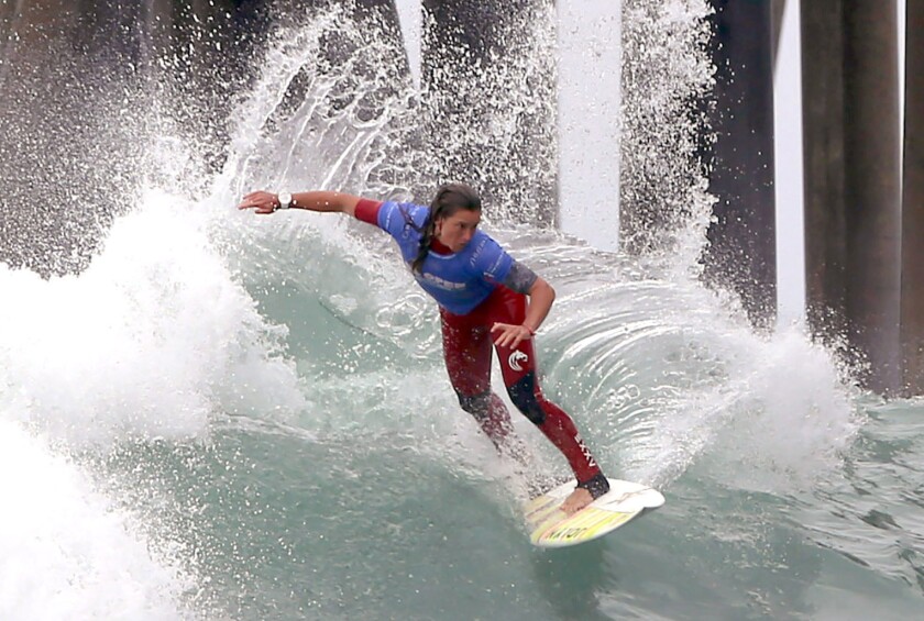 Courtney Conlogue does a cutback during the women's semifinals of the U.S. Open of Surfing on Sunday.