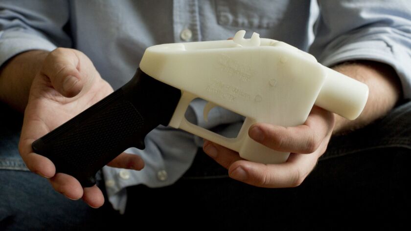 A May 10, 2013, photo shows a plastic pistol that was completely made on a 3-D printer at a home in Austin, Texas. A coalition of gun-control groups has filed an appeal in federal court seeking to block publication of blueprints to build a 3-D printed firearm.