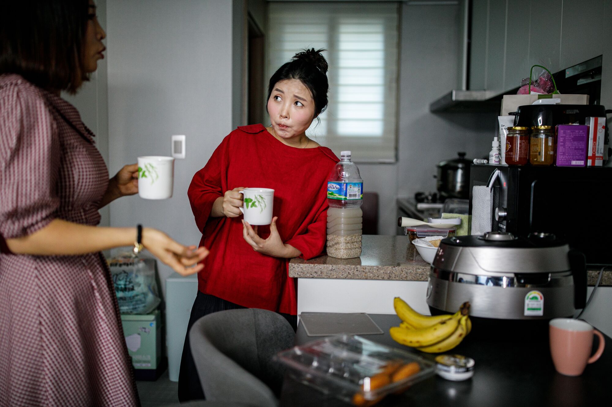 Yoon Seol Mi, right, spends time with Seok Hyeon Ju, a fellow North Korean refugee, at her home in Siheung, South Korea.