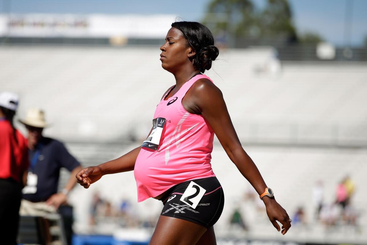 A pregnant Alysia Montano gets ready to run in the opening round of the women's 800 meter race at the USATF Outdoor Championships in Sacramento on Thursday.