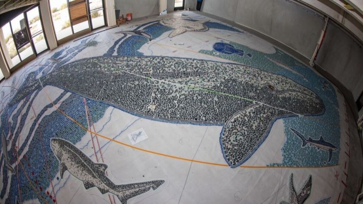 The Map is shown last year, when the tile mosaic was prefabricated in the abandoned former NOAA Fisheries Building at Scripps Institution of Oceanography.