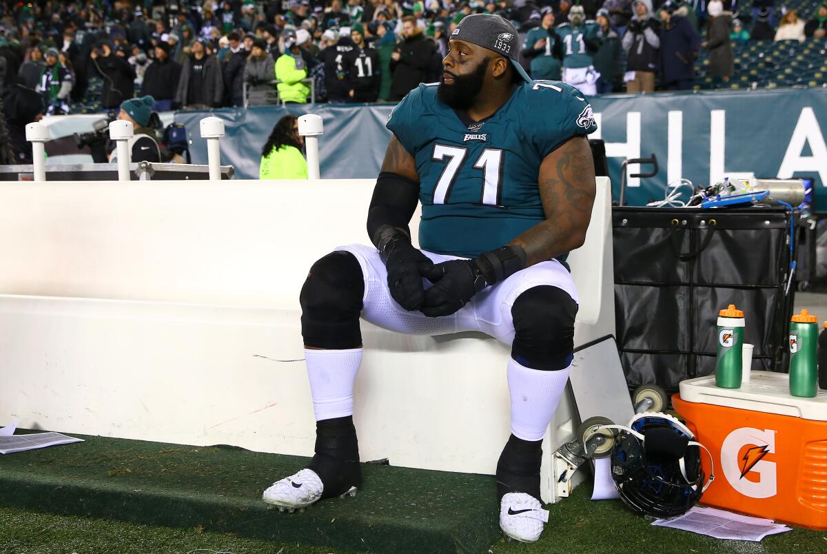 Left tackle Jason Peters, currently a free agent, rests on the Eagles bench during their playoff loss to Seattle last season.