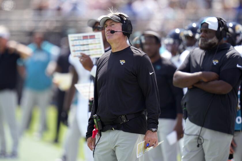 Jacksonville Jaguars head coach Doug Pederson watches from the sidelines during the first half of an NFL football game against the Houston Texans, Sunday, Sept. 24, 2023, in Jacksonville, Fla. (AP Photo/John Raoux)