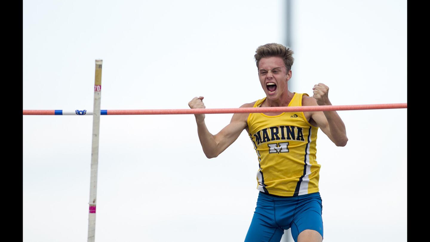 Marina's Michael Magula celebrates after clearing 15 feet in the pole vault during the CIF Southern Section Track and Field Masters Meet at Arcadia High School on Friday, May 26.