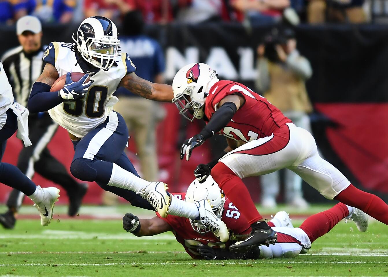 Rams running back Todd Gurley picks up yards against the Cardinals in the second quarter.