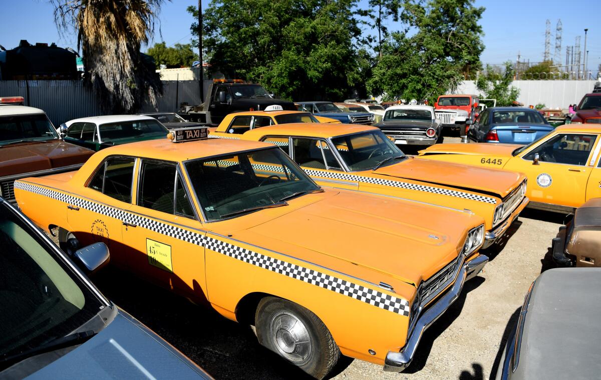 Picture Car Warehouse owns several 1960s taxi cabs that appeared on the television show "Mad Men." They won't be included in the auction. (Wally Skalij / Los Angeles Times)