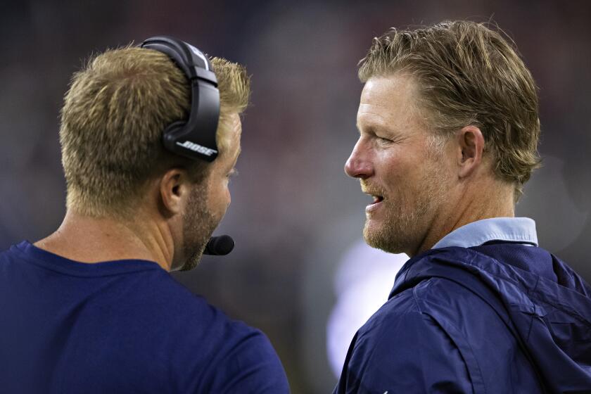 HOUSTON, TX - AUGUST 29: Head Coach Sean McVay talks with GM Les Snead of the Los Angeles Rams on the sidelines during a game against the Houston Texans during week four of the preseason at NRG Stadium on August 29, 2019 in Houston, Texas. The Rams defeated the Texans 22-10. (Photo by Wesley Hitt/Getty Images)