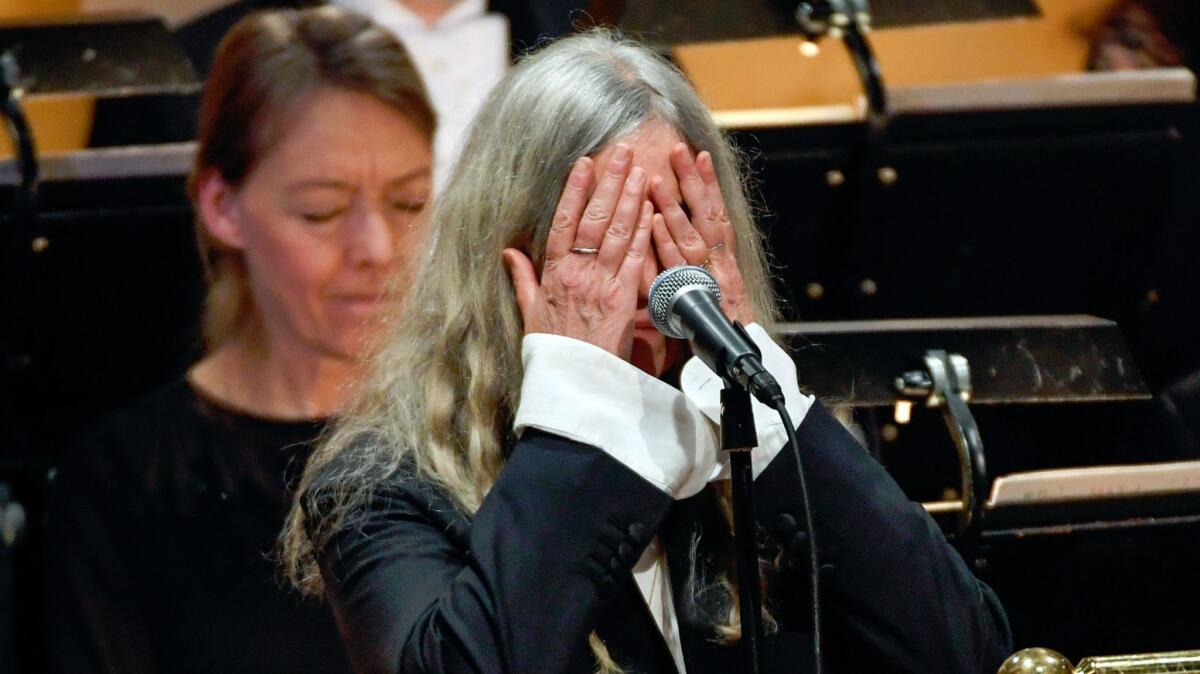 Patti Smith performing 'A Hard Rain's A-Gonna Fall' by absent 2016 Nobel literature laureate Bob Dylan during the 2016 Nobel Prize ceremony.