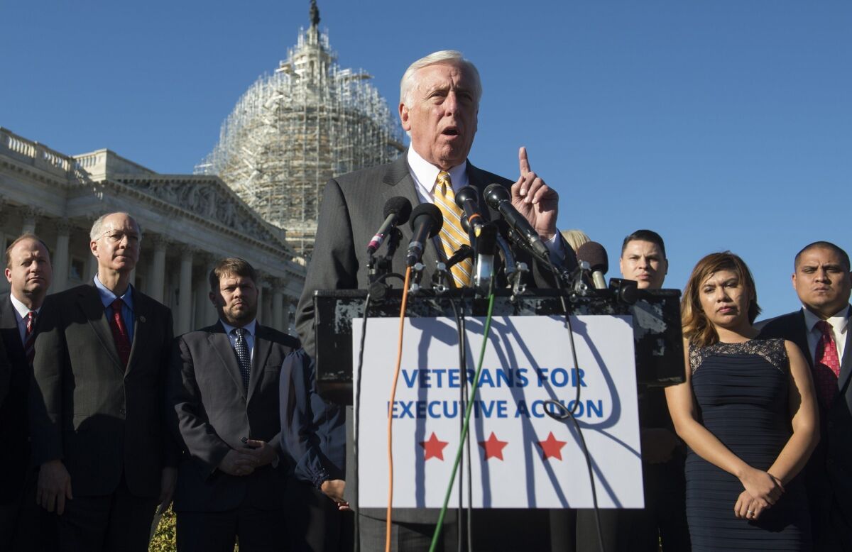 House Minority Whip Steny Hoyer (D-Md.) speaks alongside military veterans, service members and immigration reform advocates during a press conference urging President Obama to move forward with immigration reform at the Capitol on Wednesday.