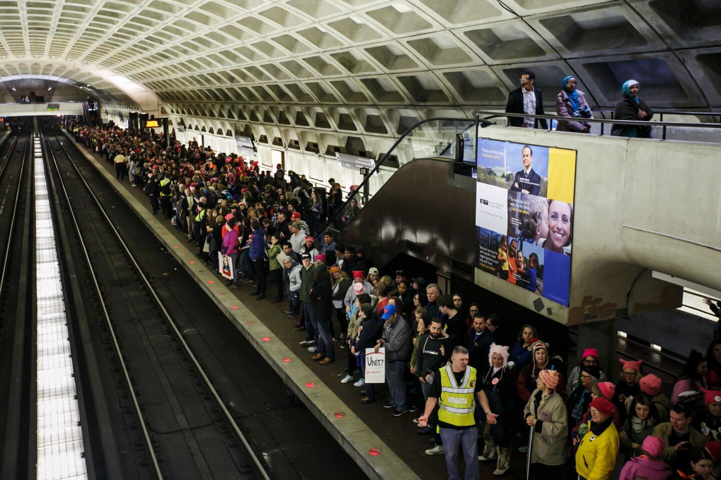 Large crowds of people pack the L'Enfant Plaza metro station after the Women's March on Washington event Saturday afternoon.