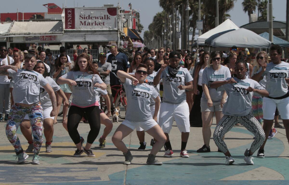 The Teen Project and Fostering Dreams through Dance gathered in a flash mob at the Venice Boardwalk last August to raise awareness about homeless youth exiting foster care. A new study found that most major California school districts are falling short in providing foster youth services.