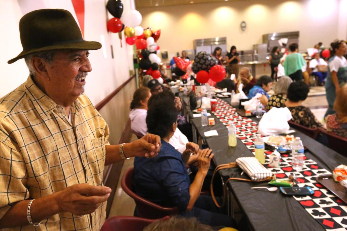 Alex Ortega, 84, dances while enjoying festivities with his fellow seniors