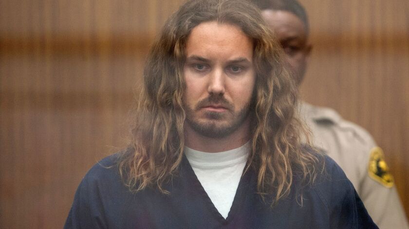 As I Lay Dying singer Timothy Lambesis is shown at his May 9, 2013, arraignment on charges of soliciting the murder of his estranged wife,