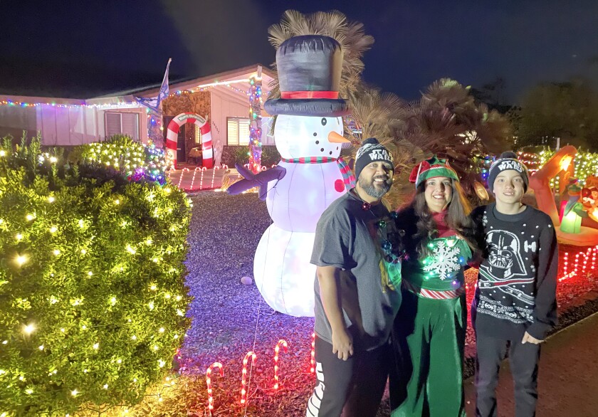 Second place winners are, from left, James and Veronica Brewster and Chris Santos.