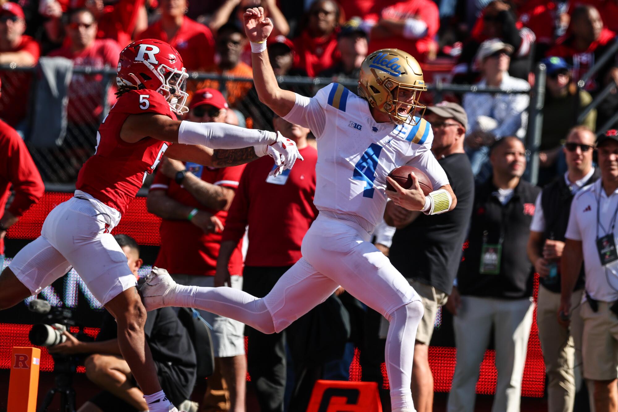 UCLA quarterback Ethan Garbers runs for a touchdown against Rutgers at SHI Stadium Saturday 