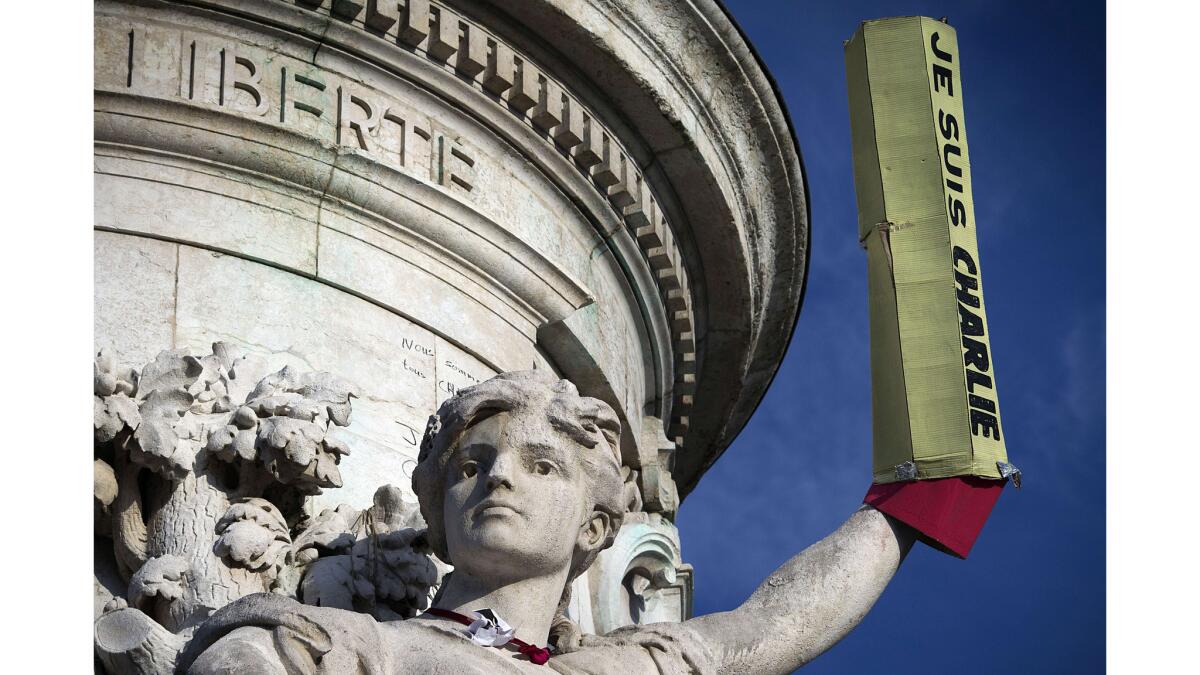 A giant pencil reading "Je suis Charlie" ("I am Charlie") adorns a statue in Paris' Place de la Republique. The killing of editorial staff members from the satirical magazine Charlie Hebdo has satirists around the globe discussing the nature of the art form.
