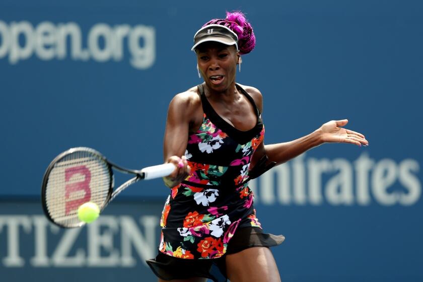Venus Williams cruised Monday into the second round of the U.S. Open.