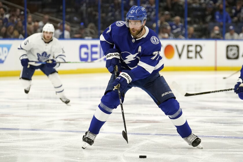Tampa Bay Lightning defenseman Victor Hedman (77) carries the puckinto the offensive zone against the Toronto Maple Leafs during the second period in Game 6 of an NHL hockey first-round playoff series Thursday, May 12, 2022, in Tampa, Fla. (AP Photo/Chris O'Meara)
