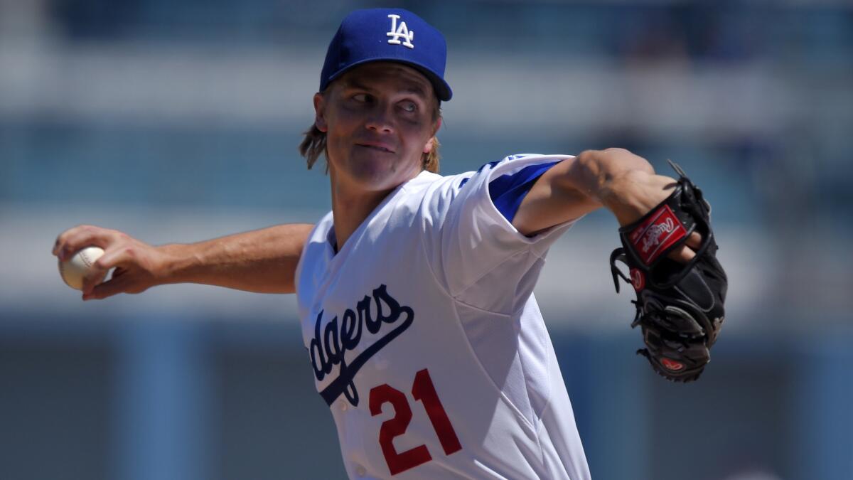 Dodgers starter Zack Greinke delivers a pitch during the first inning of a Sept. 7 game against the Arizona Diamondbacks.