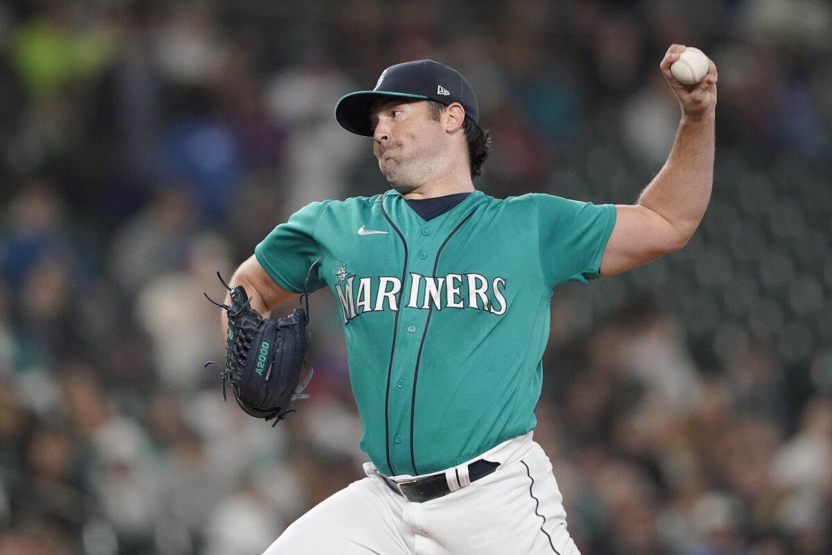 Seattle Mariners starting pitcher Robbie Ray throws against the Los Angeles Angels during the first inning of a baseball game, Friday, June 17, 2022, in Seattle. (AP Photo/Ted S. Warren)