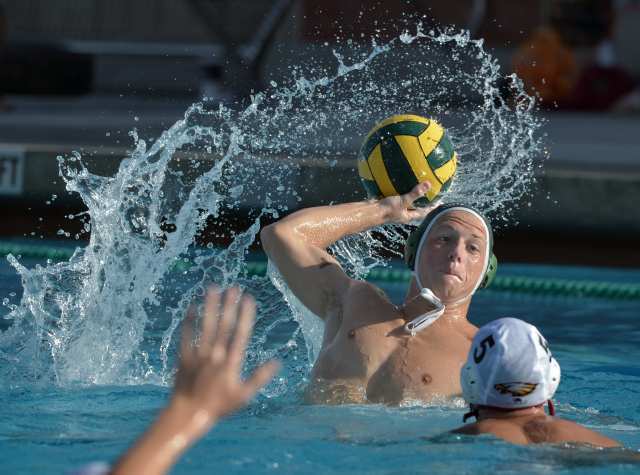 James Lewis (12) of Costa Mesa scores against Estancia in the Battle for the Bell.