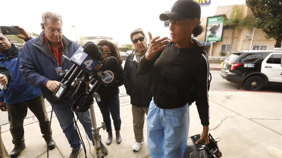 YouTube personality Zhoie Perez, 45, talks to media about being shot by a security guard outside the Etz Jacob Congregation/Ohel Chana High School on Beverly Boulevard in the Fairfax District last week.