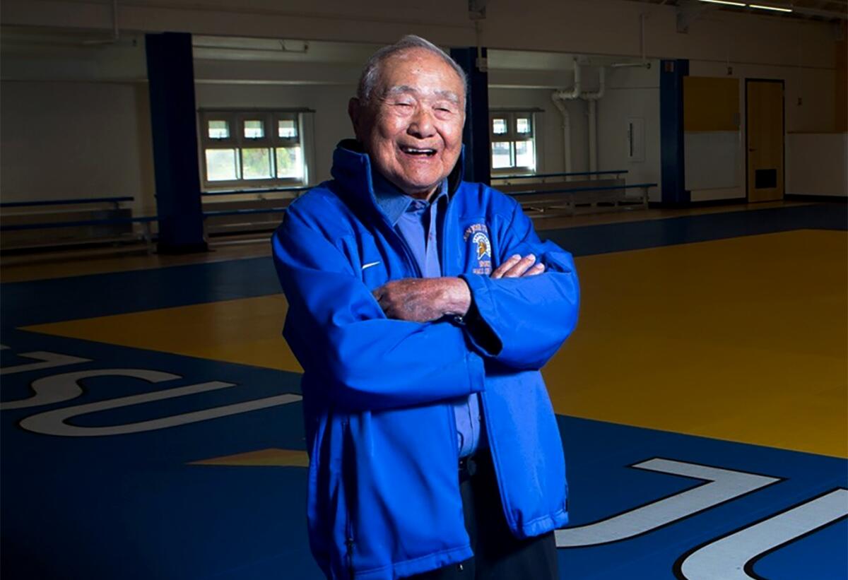 Yosh Uchida stands with arms crossed in an undated photo.