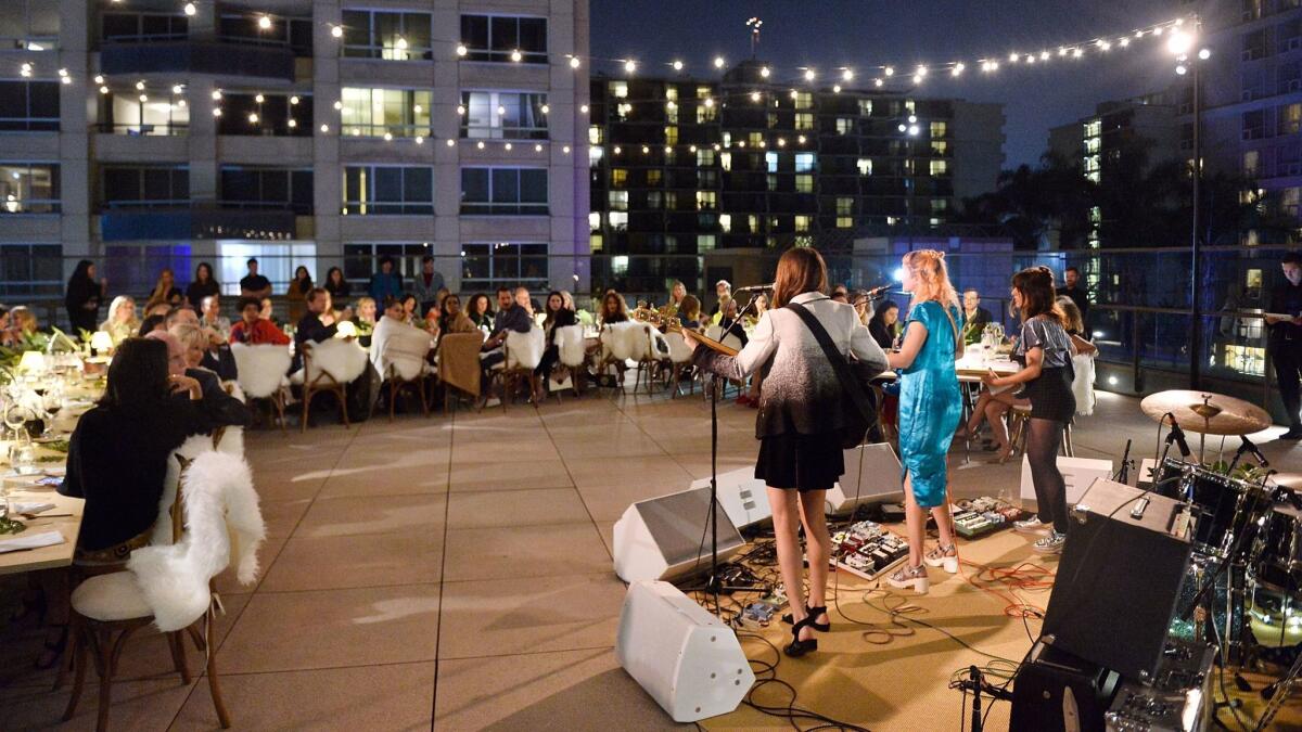 Winter performs at the Chloé x MOCA dinner on the museum's rooftop terrace in downtown Los Angeles.