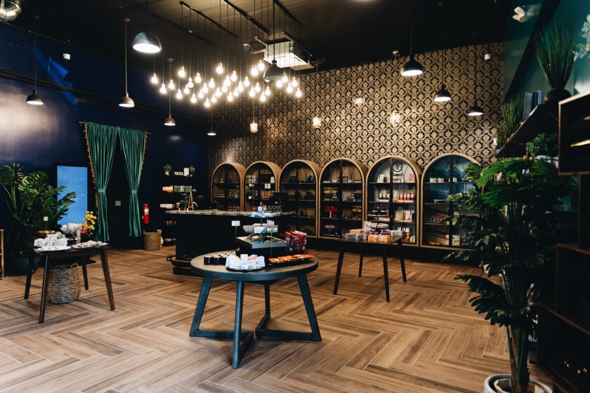 A dispensary interior with 1920s and 1930s themed decor.