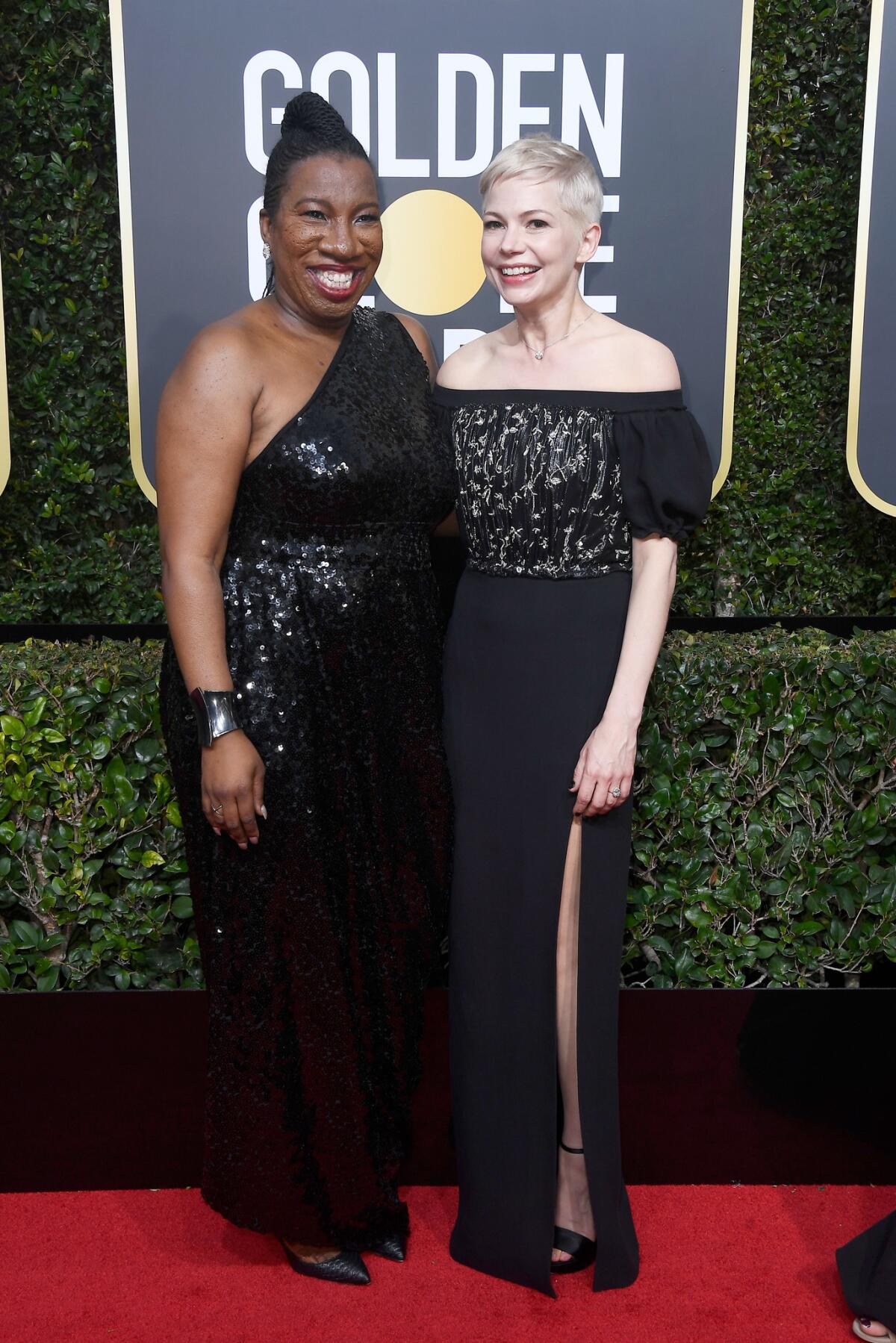 Actress Michelle Williams, right, with activist Tarana Burke, showing support for #MeToo at the 2018 Golden Globe Awards.