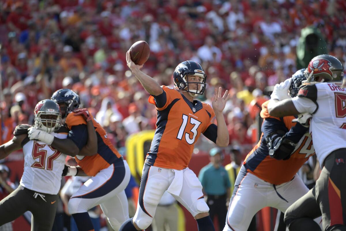 Broncos quarterback Trevor Siemian (13) throws from the pocket during a game against the Buccaneers earlier this season.