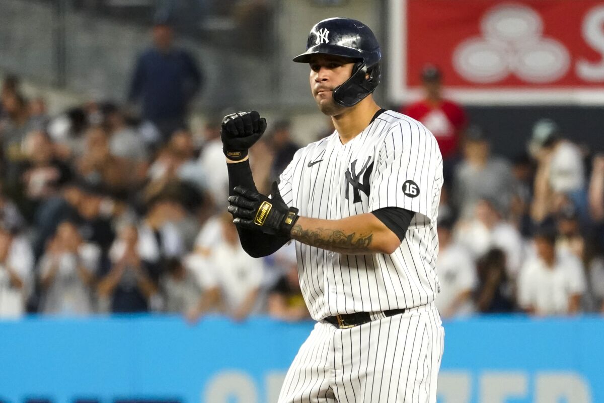 New York Yankees' Gary Sanchez reacts after hitting an an RBI double during the third inning of the team's baseball game against the Baltimore Orioles, Tuesday, Aug. 3, 2021, in New York. (AP Photo/Mary Altaffer)