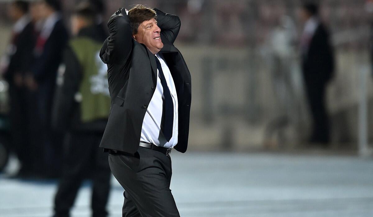 Mexico's coach Miguel Herrera gestures during the Copa America football championship match against Chile on June 15, 2015.