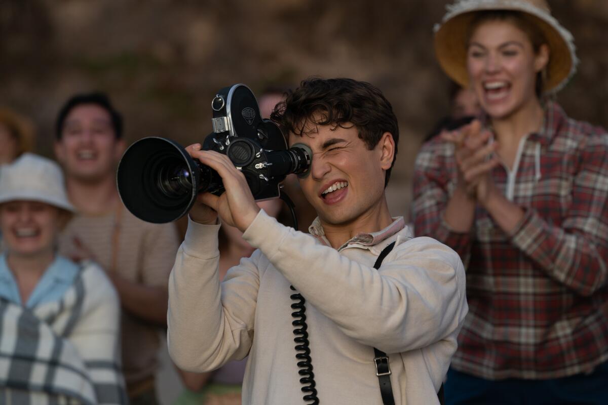 Gabriel LaBelle as Sammy Fabelman shoots his own movie in a scene from "The Fabelmans."
