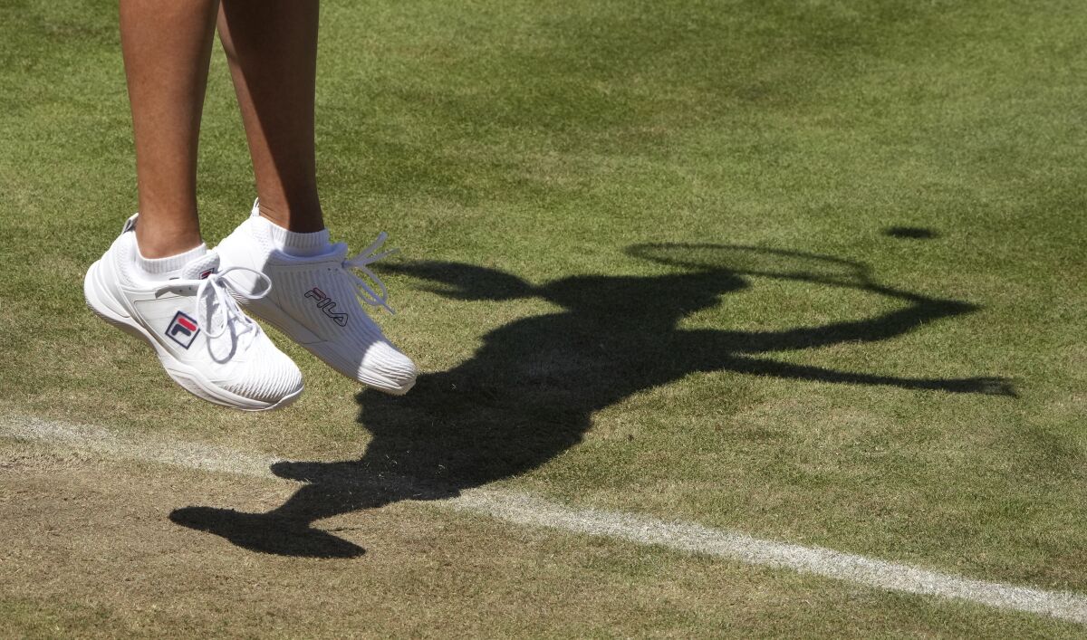Ann Li of the United States serves the ball to Coco Gauff of the United States during their WTA tournament round of sixteen tennis match in Berlin, Germany, Wednesday, June 15, 2022. (AP Photo/Michael Sohn)